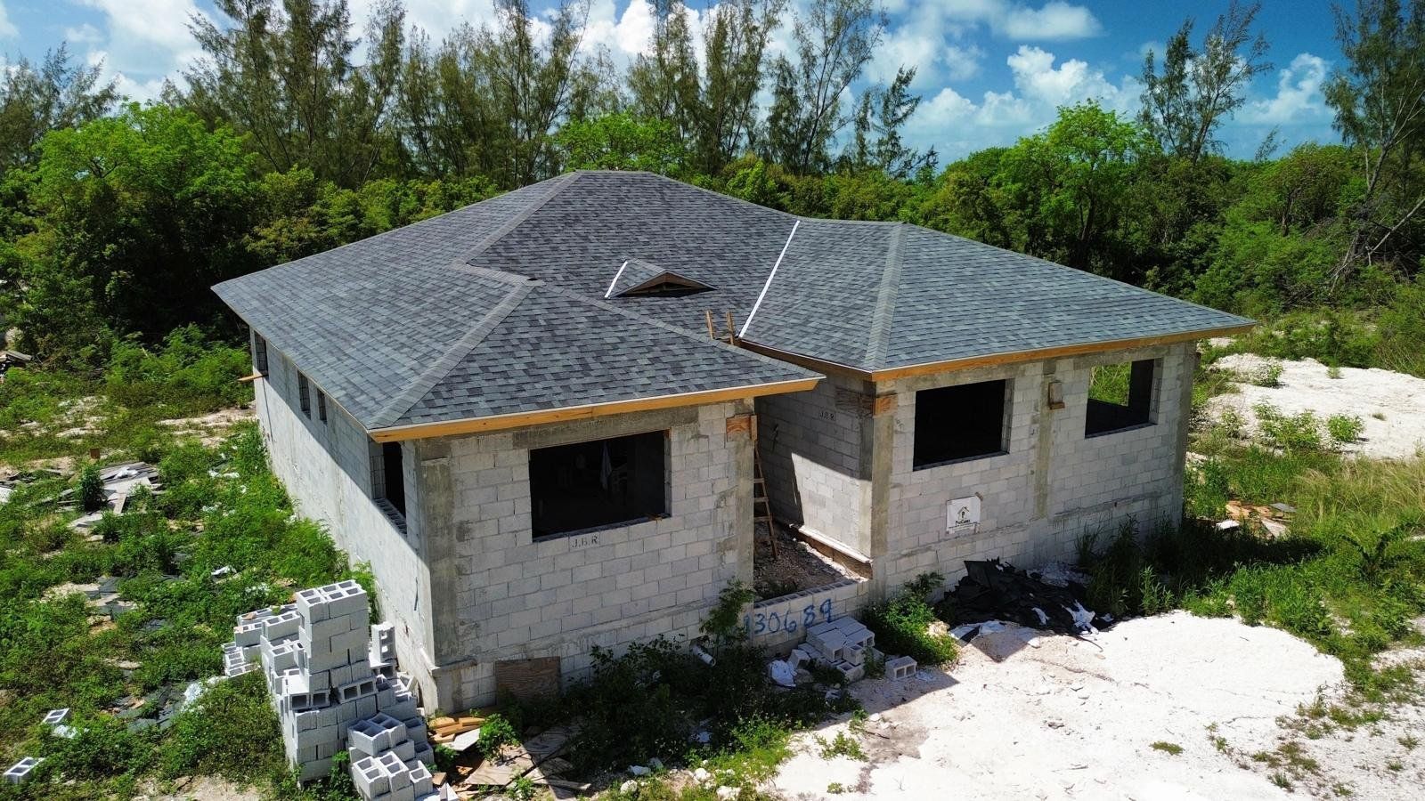Completed hip roof on a Nassau home build