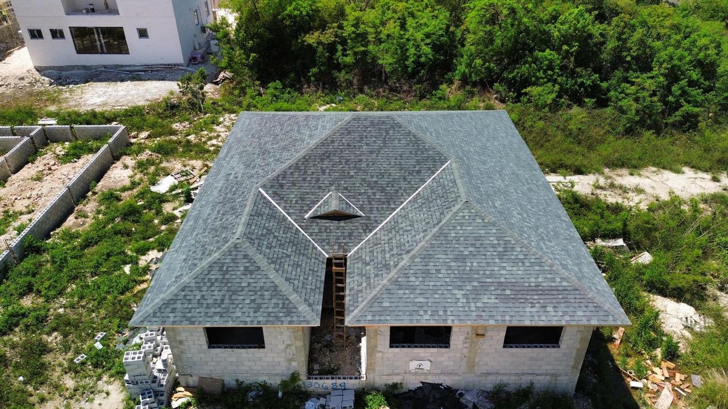 Top down aerial of completed shingle roof